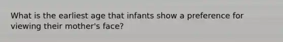 What is the earliest age that infants show a preference for viewing their mother's face?