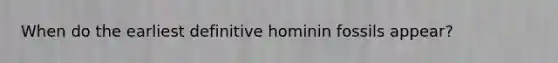 When do the earliest definitive hominin fossils appear?