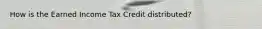 How is the Earned Income Tax Credit distributed?