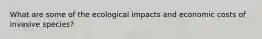 What are some of the ecological impacts and economic costs of invasive species?