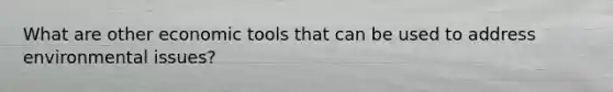 What are other economic tools that can be used to address environmental issues?