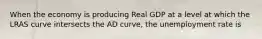 When the economy is producing Real GDP at a level at which the LRAS curve intersects the AD curve, the unemployment rate is