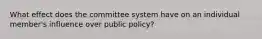 What effect does the committee system have on an individual member's influence over public policy?