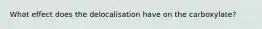 What effect does the delocalisation have on the carboxylate?