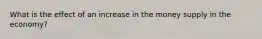 What is the effect of an increase in the money supply in the economy?