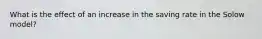 What is the effect of an increase in the saving rate in the Solow model?
