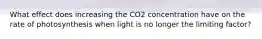 What effect does increasing the CO2 concentration have on the rate of photosynthesis when light is no longer the limiting factor?