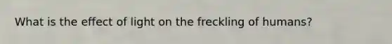 What is the effect of light on the freckling of humans?