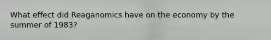 What effect did Reaganomics have on the economy by the summer of 1983?
