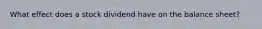 What effect does a stock dividend have on the balance sheet?