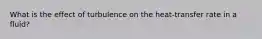 What is the effect of turbulence on the heat-transfer rate in a fluid?