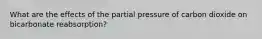 What are the effects of the partial pressure of carbon dioxide on bicarbonate reabsorption?