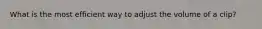 What is the most efficient way to adjust the volume of a clip?