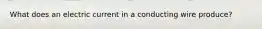 What does an electric current in a conducting wire produce?