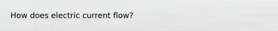 How does electric current flow?