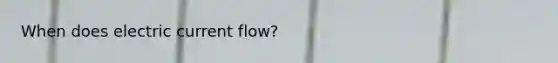 When does electric current flow?
