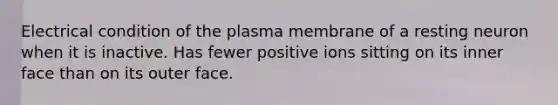 Electrical condition of the plasma membrane of a resting neuron when it is inactive. Has fewer positive ions sitting on its inner face than on its outer face.