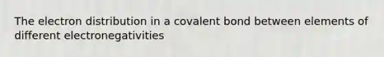 The electron distribution in a covalent bond between elements of different electronegativities