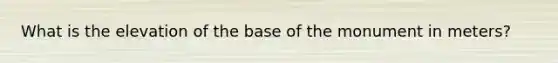 What is the elevation of the base of the monument in meters?