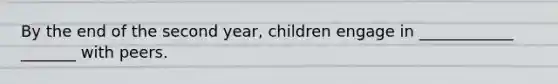 By the end of the second year, children engage in ____________ _______ with peers.