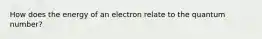 How does the energy of an electron relate to the quantum number?