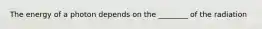 The energy of a photon depends on the ________ of the radiation