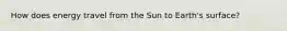 How does energy travel from the Sun to Earth's surface?