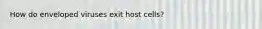 How do enveloped viruses exit host cells?