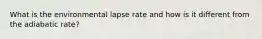 What is the environmental lapse rate and how is it different from the adiabatic rate?