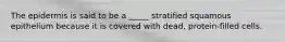 The epidermis is said to be a _____ stratified squamous epithelium because it is covered with dead, protein-filled cells.