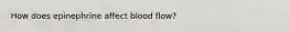 How does epinephrine affect blood flow?