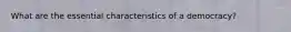 What are the essential characteristics of a democracy?