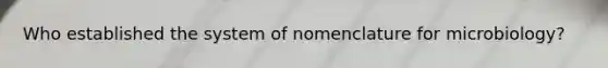 Who established the system of nomenclature for microbiology?