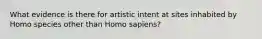 What evidence is there for artistic intent at sites inhabited by Homo species other than Homo sapiens?