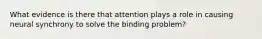 What evidence is there that attention plays a role in causing neural synchrony to solve the binding problem?