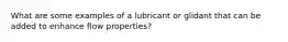 What are some examples of a lubricant or glidant that can be added to enhance flow properties?