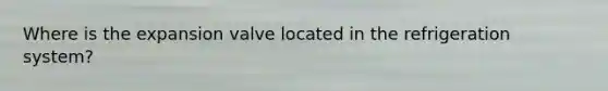 Where is the expansion valve located in the refrigeration system?