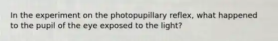 In the experiment on the photopupillary reflex, what happened to the pupil of the eye exposed to the light?