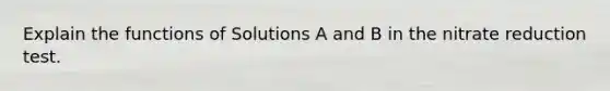 Explain the functions of Solutions A and B in the nitrate reduction test.