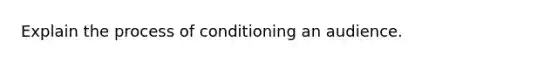 Explain the process of conditioning an audience.