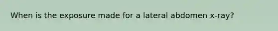 When is the exposure made for a lateral abdomen x-ray?