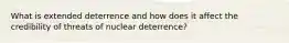 What is extended deterrence and how does it affect the credibility of threats of nuclear deterrence?