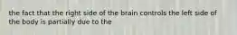 the fact that the right side of the brain controls the left side of the body is partially due to the