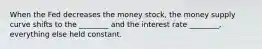 When the Fed decreases the money stock, the money supply curve shifts to the ________ and the interest rate ________, everything else held constant.