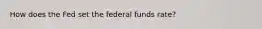 How does the Fed set the federal funds rate?