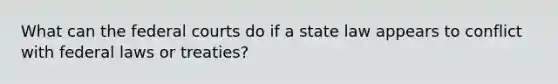 What can the federal courts do if a state law appears to conflict with federal laws or treaties?