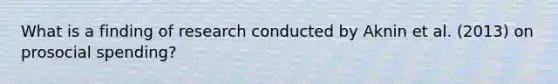 What is a finding of research conducted by Aknin et al. (2013) on prosocial spending?