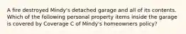 A fire destroyed Mindy's detached garage and all of its contents. Which of the following personal property items inside the garage is covered by Coverage C of Mindy's homeowners policy?