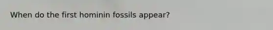 When do the first hominin fossils appear?