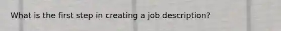 What is the first step in creating a job description?